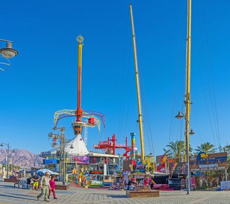 EILAT, ISRAEL - FEBRUARY 23, 2016: The small  amusement park  in the city center on promenade, on...