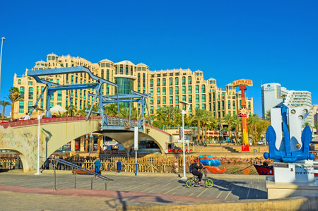 EILAT, ISRAEL - FEBRUARY 23, 2016: The Memorial drawbridge across Lagoona with the Hilton Hotel...