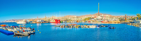 EILAT, ISRAEL - FEBRUARY 24, 2016: Panorama of resort with the large harbor, amusement park and...