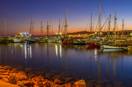 EILAT, ISRAEL - FEBRUARY 24, 2016: The nice view of the evening port, full of yachts and boats, with...