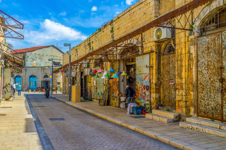 TEL AVIV, ISRAEL - February 25, 2016: The lamps shop in the flea market neighborhood of Jaffa offers the colorful chandeliers and lamps for each taste, on February 25 in Tel Aviv.のeditorial素材