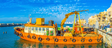 TEL AVIV, ISRAEL - FEBRUARY 25, 2016: The old fishing trawler moored in port of Jaffa, on February 25 in  Tel Aviv.のeditorial素材