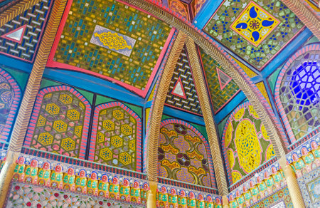 BUKHARA, UZBEKISTAN - APRIL 29, 2015: The stained glass screens on the ceiling in dining room of Sitorai Mokhi-Khosa Palace with unique colorful ornaments, on April 29 in Bukhara.のeditorial素材