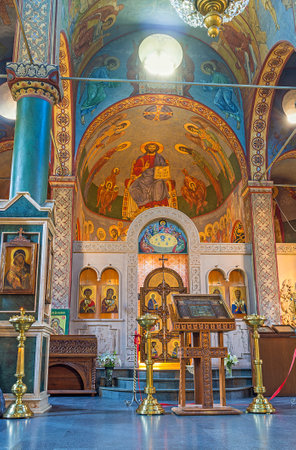 BATUMI, GEORGIA - MAY 24, 2016: The colorful murals on the apse of St Nicholas Church and the carved stone iconostasis, on May 24 in Batumi.のeditorial素材