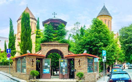 TBILISI, GEORGIA - MAY 28, 2016: The  gate leads to the Georgian Orthodox Jvris Mama Church and...