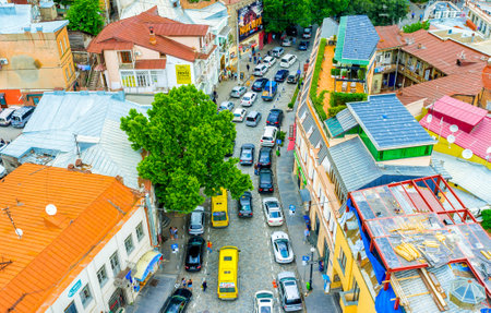TBILISI, GEORGIA - MAY 28, 2016: The view from the cable car on the old town colorful roofs and traffic jam in the twisted street, on May 28 in Tbilisi.のeditorial素材