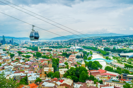 The cable car is the best choice to discover city from the top and get to the Narikala Fortress, Tbilisi, Georgia.の写真素材