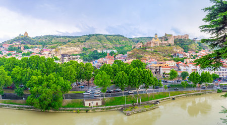 The hills in Tbilisi topped with the medieval landmarks, such as Tabor Monastery and Narikala Fortress, Georgia.のeditorial素材