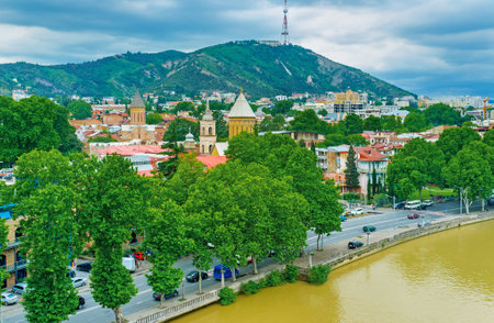 The Metekhi Bridge is the perfect viewpoint, overlooking embankment of Kura river with such landmarks, as Sioni Cathedral and Jvris Mama Church, Tbilisi, Georgia.のeditorial素材