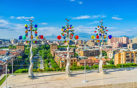 YEREVAN, ARMENIA - MAY 29, 2016: The weathervane trees, made of metal with glass flowers, located on the fouth level of Cascade, on May 29 in Yerevan.のeditorial素材