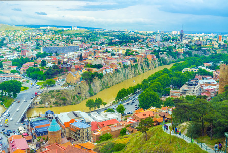 The view on Kura River and its rocky shores from the Sololaki Hill, Tbilisi, Georgia.の写真素材