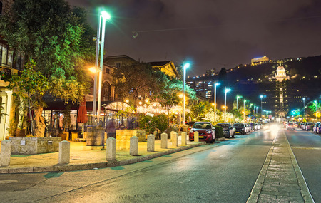The evening is the best time to visit one of the local cafes in German Colony and enjoy the Jewish or Arab cuisine, Haifa, Israel.の写真素材