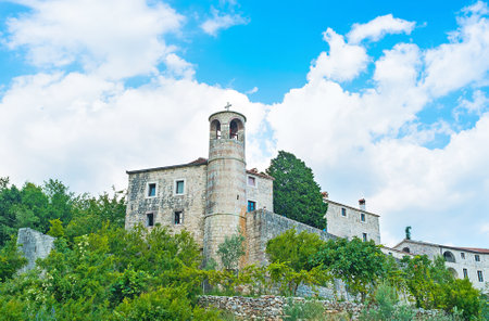 The bell tower of Podmaine Monastery was used as the watchtower in the Middle Ages, Budva, Montenegro.のeditorial素材