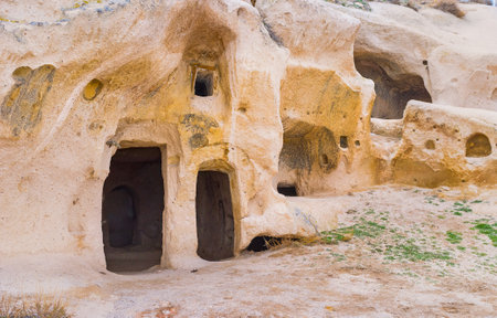 The openings to the chambers in the ancient Uchisar Castle in rock, Cappadocia, Turkey.のeditorial素材