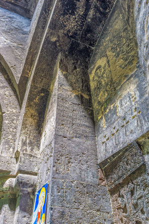 HAYRAVANK, ARMENIA - MAY 31, 2016: The wall in Church of Hayravank Monastery decorated with carved...