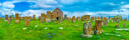Panorama of Noratus Cemetery, one of the most amazing religious landmarks of Gegharkunik Province, with numerous preserved medieval khachkars, Armenia.の写真素材