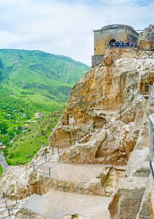 Visiting of Vardzia monastic site is the nice opportunity to walk among the old caves on the rocky Erusheti mountain slope, discover medieval church and enjoy the views, Samtskhe-Javakheti Region, Georgia.の写真素材