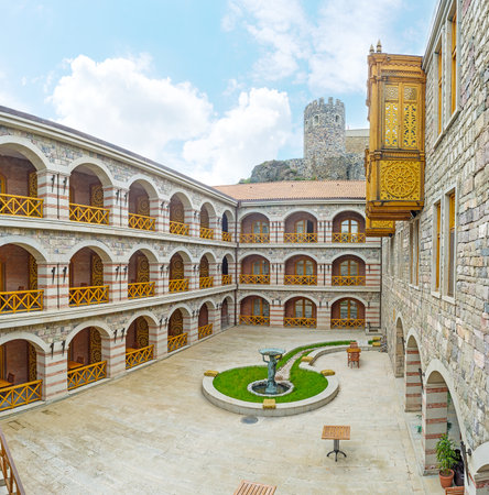 The small fountain in the flower bed of the inn, located next to the upper Rabati fortress, Akhaltsikhe, Georgia.のeditorial素材