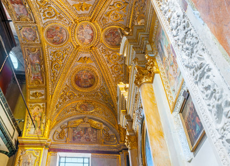 AJACCIO, FRANCE - MAY 2, 2013: The ceiling of Chapel of the Madonna of Pianto in Cathedral of Our Lady of the Assumption of Ajaccio, with the scenic golden patterns and icons in medallions, on May 2 in Ajaccio.のeditorial素材