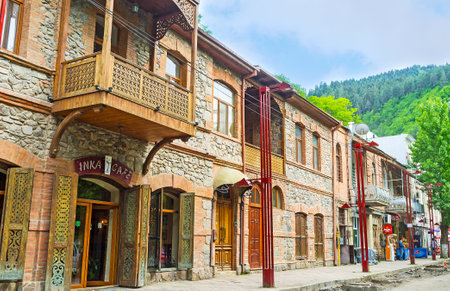 BORJOMI, GEORGIA - MAY 26, 2016: The tourist street with the renovated stone houses with souvenir stalls, cafes of local cuisine, wine shops, on May 26 in Borjomi.のeditorial素材
