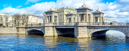 SAINT PETERSBURG, RUSSIA - APRIL 25, 2015: Panorama of towered Lomonosov Bridge with architectural ensemble of Lomonosov Square on the background, on April 25 in Saint Petersburg.のeditorial素材