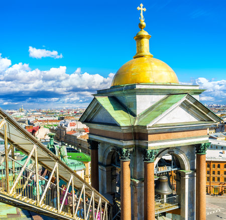 SAINT PETERSBURG, RUSSIA - APRIL 25, 2015: The tourists on the covered staircase climb to the rooftop of the St Isaac's Cathedral, overlooking beautiful bell towers and city roofs, on April 25 in Saint Petersburg.のeditorial素材