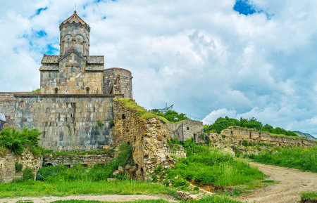The remains of the medieval wall of the fortress next to the Astvatsatsin (Mother of God) Gate Church in Tatev Monastery, Syunik Province, Armenia.のeditorial素材
