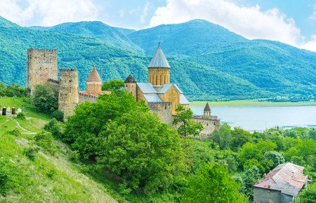 The Ananuri Castle complex among the lush greenery at the hilly bank of Aragvi river, Mtskheta-Mtianeti, Georgia.のeditorial素材