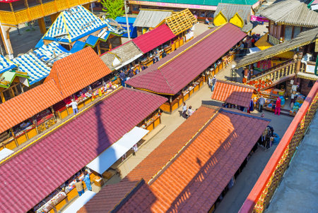 MOSCOW, RUSSIA - MAY 10, 2015: All the stalls of Izmailovsky Market are hidden under the red roofs,...