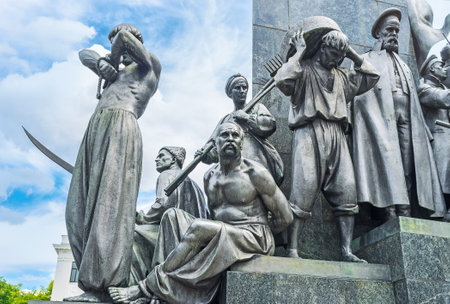 The statues of Ukrainian peasants -serfs around the monument to the famous poet, writer and freedom...