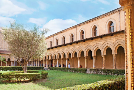 MONREALE, ITALY - OCTOBER 10, 2016: The Monreale Cloister is famous for the old garden, decorated with unique columns of covered gallery, on October 10 in Monreale.のeditorial素材