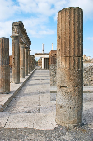 The ruins of Apollo Temple with preserved stone columns, Pompeii, Italy.のeditorial素材