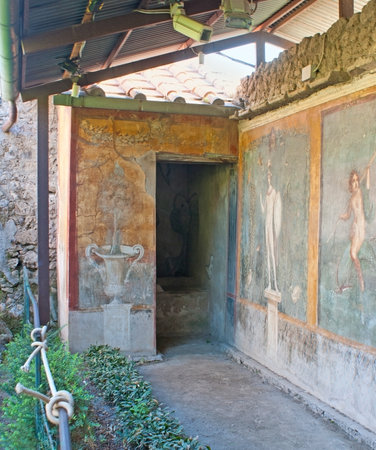 POMPEII, ITALY - OCTOBER 4, 2012: The remains of the painted wall in the small garden of the antique villa, on October 4 in Pompeii.のeditorial素材