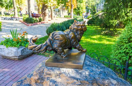 The sculpture of the cat in Zolotovorotsky (Golden Gate) park is the favorite place of meatings of couples, Kiev, Ukraine.の写真素材