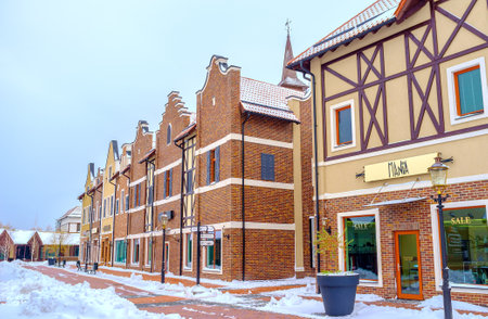 KIEV, UKRAINE - NOVEMBER 11, 2016: The stepped gable houses in Dutch Revival style shopping neighborhood serves as fashion stores, cafes and art galleries, on November 11 in Kiev.のeditorial素材
