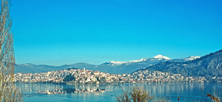 Panorama of Kastoria, located on peninsula in Orestiada Lake, Greece.の写真素材