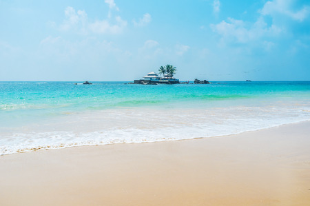 The Seenigama Muhudu Viharaya Buddhist Temple on the tiny island is the notable landmark of Hikkaduwa, Sri Lanka.の写真素材