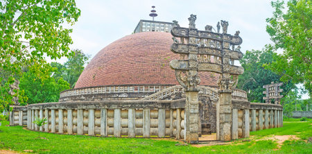 The replica of the Great Indian Sanchi Stupa with its famous Torana Gates, decorated with sculptures and reliefs, Mihintale, Sri Lanka.のeditorial素材