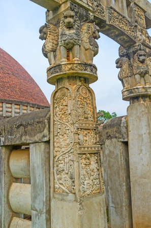 Detail of Torana Gate of Great Sanchi Stupa's replica in Mihintale with figures of lions and complex reliefs on the vertical beam, Sri Lanka.のeditorial素材