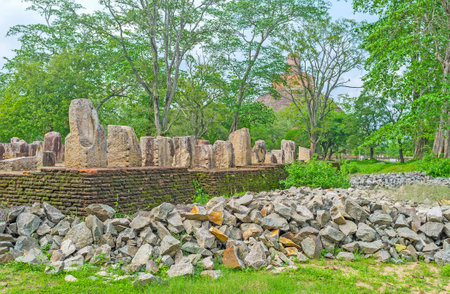 The ruins of the Chapter House  (Diyasen paya) of Jetavana Vihara with the giant brick Stupa on background, Anuradhapura, Sri Lanka.のeditorial素材