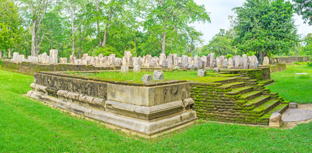 The Chapter House  (Diyasen paya) of Jetavana Vihara with the broken stone pillars and brick foundation, covered with moss, Anuradhapura, Sri Lanka.のeditorial素材