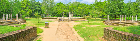 Panorama of the archaeological site of Mahasena Palace, surrounded by lush greenery, Anuradhapura, Sri Lanka.のeditorial素材
