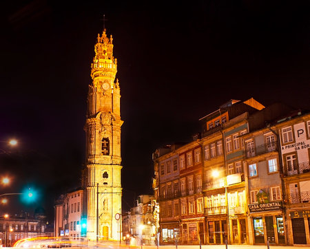 PORTO, PORTUGAL - APRIL 29, 2012: The brightly illuminated Tower of Clerigos Church is one of the tallest city buildings, on April 29 in Porto.のeditorial素材