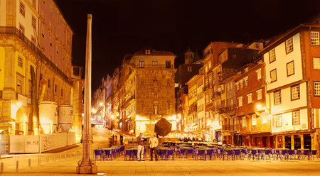 PORTO, PORTUGAL - APRIL 29, 2012: The evening view of Ribeira Square with numerous outdoor cafes and restaurants, surrounded by historic houses, on April 29 in Porto.のeditorial素材