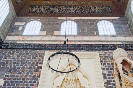 DIYARBAKIR, TURKEY - JANUARY 15, 2015: The stone prayer hall of the Great Mosque decorated with covered by old hieroglyphs timbers, on January 15 in Diyarbakir.のeditorial素材