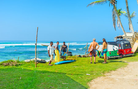 AHANGAMA, SRI LANKA - DECEMBER 3, 2016: The local beach is popular among surfers and local fishermen, on December 3 in Ahangama.のeditorial素材