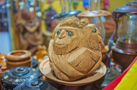 The hand carved monkey, made of coconut, could be original gift from Sri Lanka, Galle.の写真素材