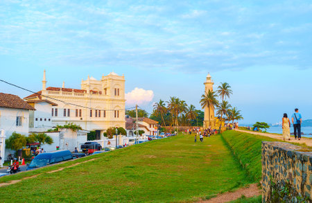 GALLE, SRI LANKA - DECEMBER 3, 2016: The old ramparts are perfect place to overlook old town and enjoy the view on Meera Mosque and the lighthouse, on December 3 in Galle.のeditorial素材