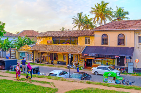 GALLE, SRI LANKA - DECEMBER 3, 2016: The Rampart Street occupied with various tourist cafes and taverns, offering tasty local, Indian and European cuisine, on December 3 in Galle.のeditorial素材