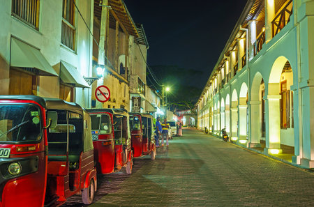 GALLE, SRI LANKA - DECEMBER 3, 2016: The tuk tuks parking at the historic building of Old Dutch Hospital, nowadays serving as hotel and luxury restaurant, on December 3 in Galle.のeditorial素材